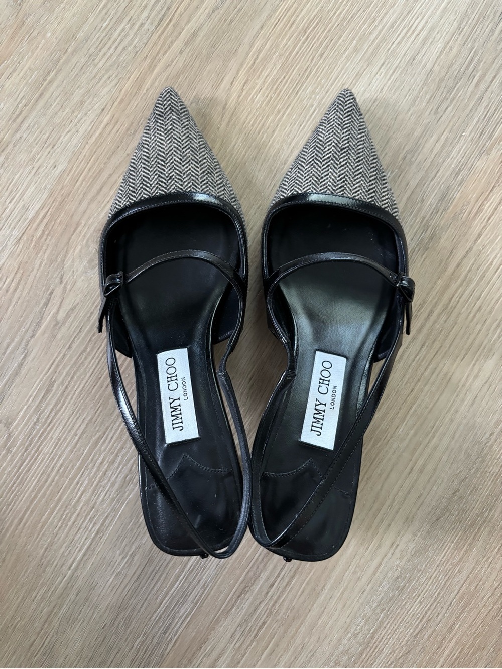 Jimmy Choo
Didi 45MM Herringbone Leather Slingback Pumps